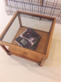 small glass top coffee table on wheels