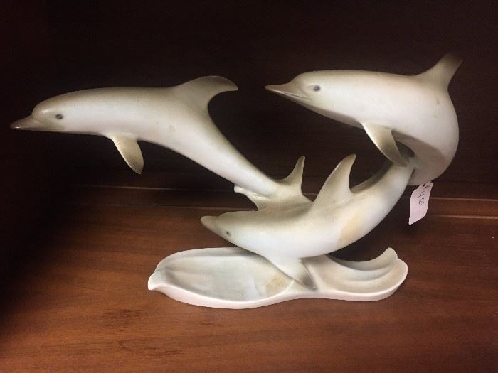 Dolphin figurine.