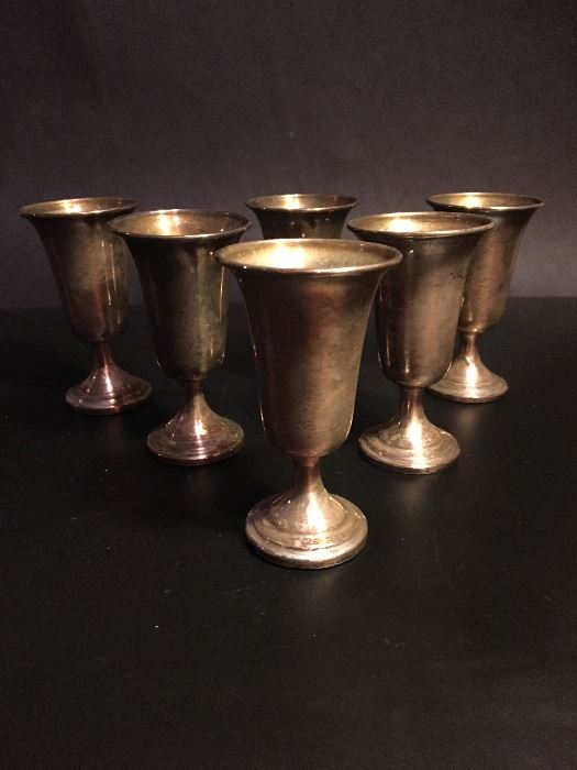 A set of six Sterling cordial or port wine goblets by National Silver Company.