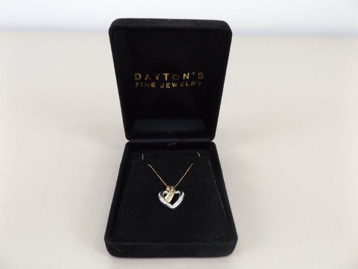 14K Gold and Sterling Silver Pendant with Genuine Diamonds on a 10K Gold Necklace (3.2 grams Total Weight)
