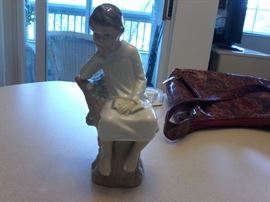 . Lladro Thinker Boy sitting on tree stump Book http://www.ctonlineauctions.com/detail.asp?id=666314