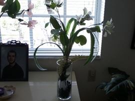 Glass vase fake flowers  http://www.ctonlineauctions.com/detail.asp?id=666302