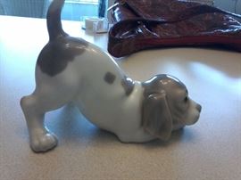 Lladro Playful Puppy #9135. http://www.ctonlineauctions.com/detail.asp?id=666305