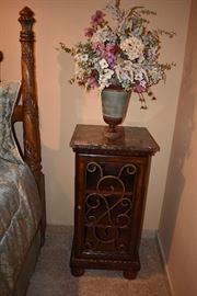 Marble top table and silk flowers