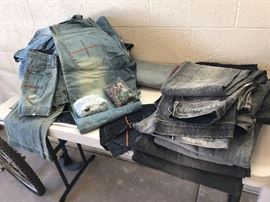 Tons of denim fabric, rivets, some jeans, shorts and skirts, and yards of unused fabric.