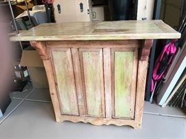 Handmade bar purchased from “ Big Bronco” in Cave Creek has two matching barstools