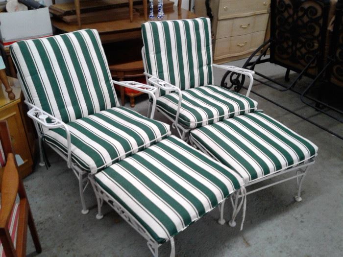 Vintage metal Patio chairs and ottomans with cushions.