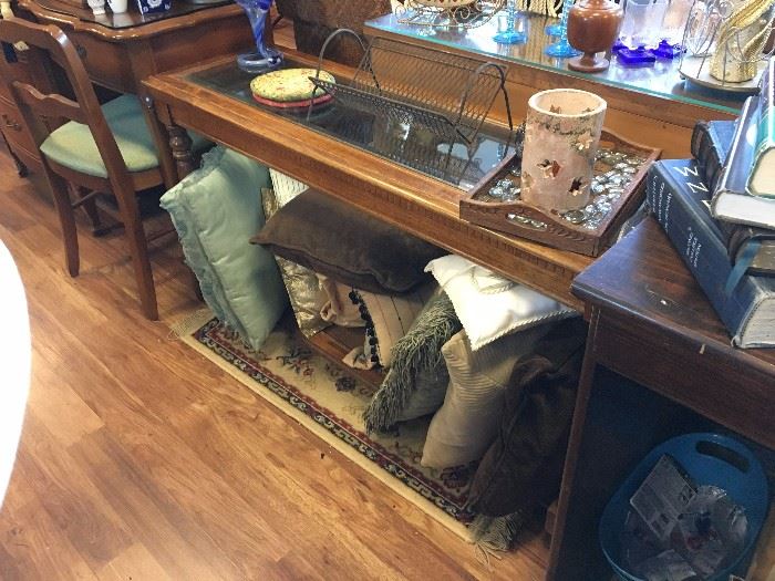 Glass Top Foyer Table. Decorative pillows.