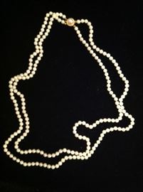 Pearl double strand necklace - 26" with 14 kt gold clasp - $ 250.00
