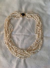 Multi strand pearl necklace with 14 kt gold clasp - 18" - $ 200.00 - Reserve established for this piece.
