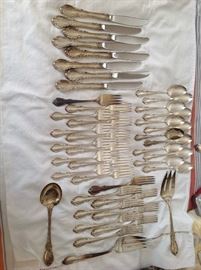 Towle Legato Sterling Service flatware set - 41 pieces.  Includes 8 weighted knives, 12 spoons, 12 salad forks, 8 dinner forks, 2 serving forks, 1 serving spoon.  1523 total grams for all but weighted knives.  Weighted knives 553 grams.   $1,200.00