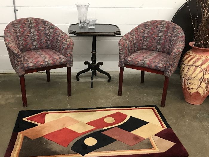 Pair of accent chairs, decorative rugs, accent table