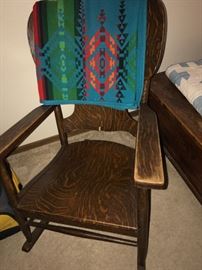 Antique rocking chair draped with beautiful Pendelton blanket 