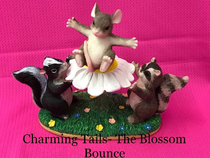 Charming Tails figurine; “The Blossom Bounce.” 