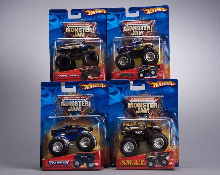 Offered is a lot of 4 Hot Wheels Monster Jam trucks. The cards show normal shelf wear but the toys are undamaged. Please see the photos at completeset.com for details.