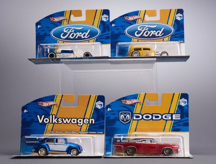 Offered is a lot of 4 carded Hot Wheels vehicles. The packages show minor wear but the toys are undamaged. Please see the photos at completeset.com for details.