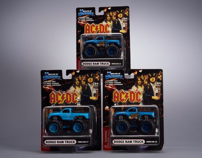 Offered is a lot of 3 ACDC monster trucks from Muscle Machines. The cards show minor wear but the toys are undamaged. Please see the photos at completeset.com for details.