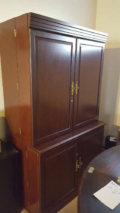Cherry desk/cabinet with hide a way feature   $100