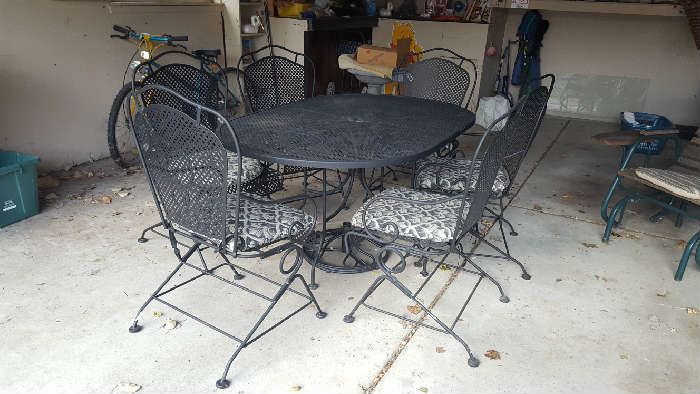 Wrought iron patio set with chairs    $75