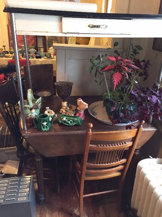 table, wood chairs, plants
