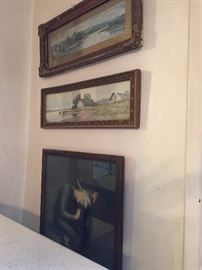 so many framed older pictures on the walls