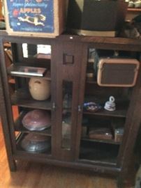 beautiful arts and crafts china cabinet with beveled mirror inside on the back of the top shelf