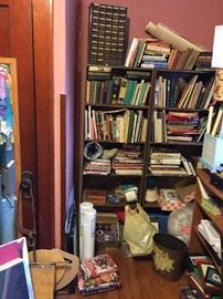 books (many vintage) some are sewing, knitting, etc. yarn skeins, spools of string, more bookcases