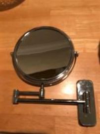 Wall mount magnifying mirror
