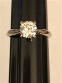 14k gold ring with white stone