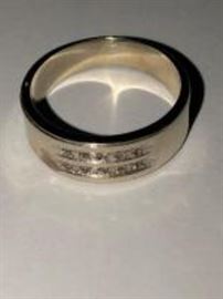 gold band with diamonds