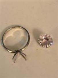 White gold setting with a loose stone