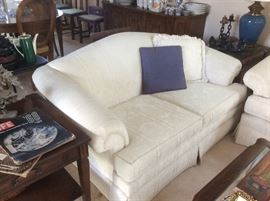 White brocade loveseat 