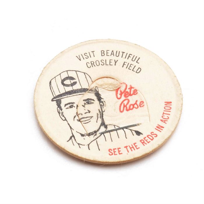 Pete Rose 1963 French Bauer Lid: A Pete Rose 1963 French Bauer milk lid. These cardboard lids had illustrations of a Cincinnati Reds player, their name was printed in red script lettering along with “Visit Beautiful Crosley Field” and “See The Reds In Action”. The lid is not dated. French Bauer was a dairy company in Cincinnati, Ohio and Lexington, Kentucky.