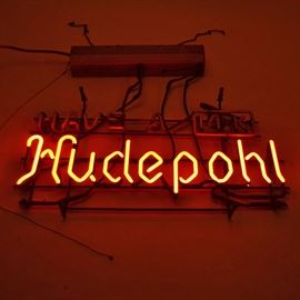 Hudepohl 14K Beer Neon Sign: A vintage late 1940s/1950s Hudepohl 14-K beer neon sign. The sign has “Have a 14K Hudepohl” in multicolor. The sign’s transformer was produced by FranceFormer, The France Manufacturing Co. Westlake, Ohio. It’s a “Gaseous Tube Transformer”. The metal plate on the transformer has “Cat. 75420FZP”, “SER. 966”. “Have a” is in green, the square around the 14-K is yellow, the 14-K is white and the “Hudepohl” is in day-glo red. The transformer has the pull chain for turning the sign on and off. Hudepohl beer was a brewery located in Cincinnati, Ohio, founded in 1885.