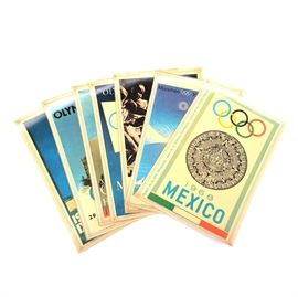 1972 Olympic/B.C. Cartoon Placemats: A set of placemats from 1972 using Johnny Hart’s comics B.C. to help promote the 1972 Olympics. There are eight placemats, two sided – one side depicts an image of a past Olympic, the other side has a character from the B.C. comic strip acting out a sport or carrying the Olympic torch. The Olympics represented are from 1928, Amsterdam; 1932, Los Angeles; 1948 London; 1952 Helsinki; 1956 Melbourne; 1964 Tokyo; 1968 Mexico and 1972 Munchen. The placemats are mini posters that have been laminated; produced by Antik Print Amsterdam.