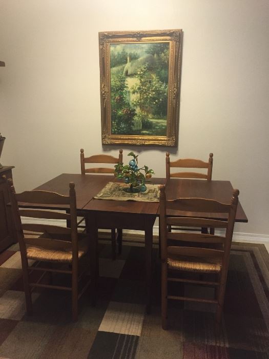 Walnut gate leg table and 4 rush seat chairs