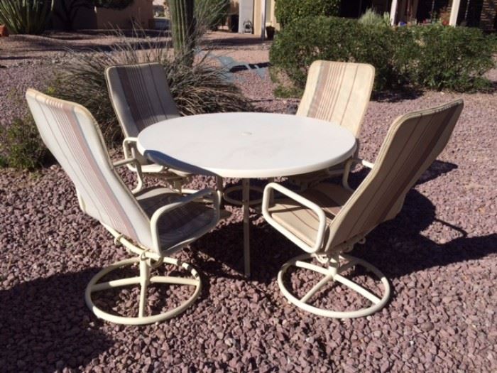 Samsonite Fiberglass Round Table w/ 4 Swivel Rocking Chairs
