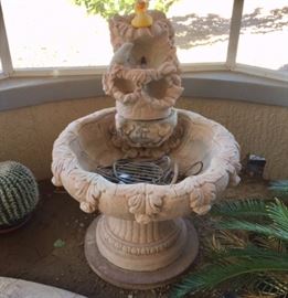 Concrete Fountain is 27'round x 37H 