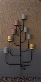 Wrought iron candleholder is 24w x 48h