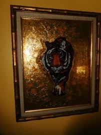 Vintage foiled tiger under glass
