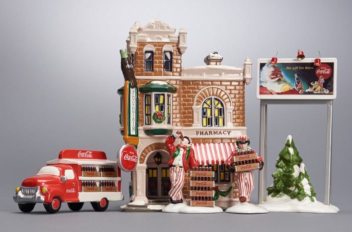 Offered is a lot of 4 Coca-Cola village pieces from Department 56: "Coca-Cola Corner Drugstore", Coca-Cola "Billboard", "Coca-Cola Delivery Truck", and "Coca-Cola Delivery Men". The boxes show normal shelf wear but the pieces are undamaged. The lighting units have not been tested. Please see the photos at completeset.com for details.