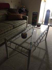 Coffee table glass and iron in guest room 