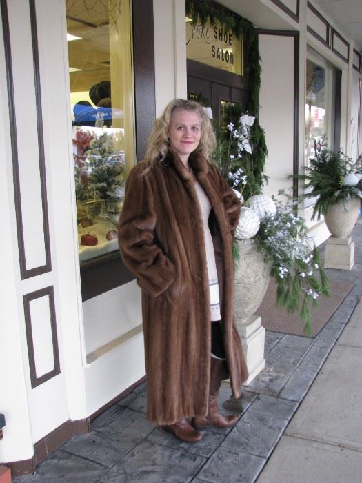 1- Pastel mink, split male skins. Approximately 20 years old. Size 10. Model is 5'4". $800.00