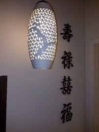 Asian hanging lamp and metal wall art