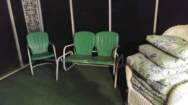 Green metal vintage glider and two matching chairs excellent condition