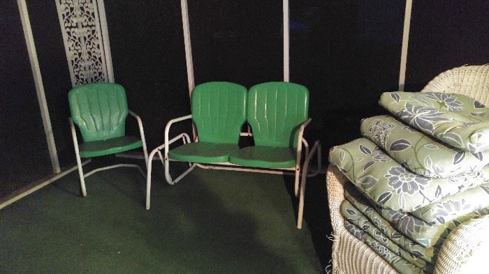 Green metal vintage glider and two matching chairs excellent condition