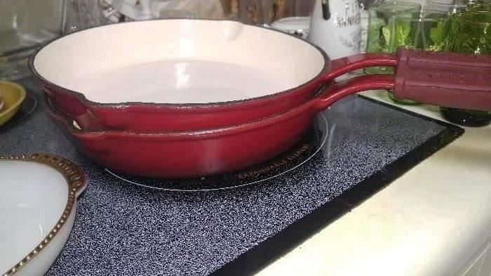 Red cast iron enamel cookware several pieces