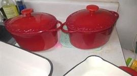 Red cast iron enamel cookware several pieces