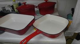 Red cast iron enamel cookware several pieces
