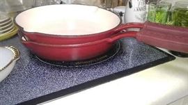 Red cast iron enamel cookware several pieces